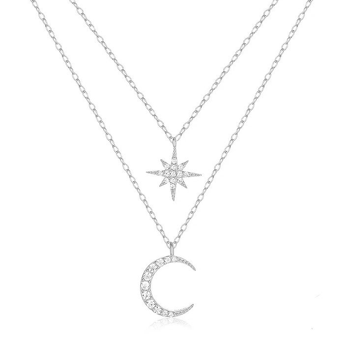 Zilveren Dubbele Ketting met Ster en Maan Hangers - Elegante Charme van Elenza 1 Zilveren Dubbele Ketting met Ster en Maan Hangers - Elegante Charme van Elenza